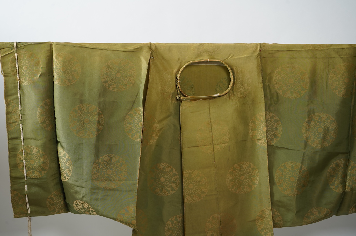Two 1880-1920 Japanese green silk damask Kariginu, ‘hunting cloth’ robes, worn not as ‘hunting robes’ at this period, but as day wear for high ranking male Imperial Court nobles, traditionally worn with a sash at the wai
